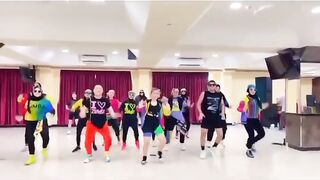 Practicing Zumba exercises with club friends, by Zin Gita