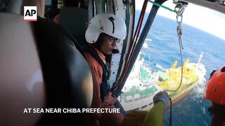 WATCH_ Swimmer swept out to sea rescued by Japanese Coast Guard.