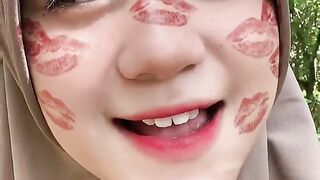 beautiful hijab-wearing woman playing tik tok 8