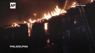 Residents react after huge apartment fire in Philadelphia.
