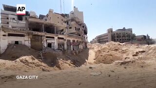 Aftermath of fighting, airstrikes in Gaza City neighbourhood.