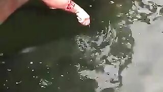 Noodling is fishing using one's bare hands or feet,  Watch this