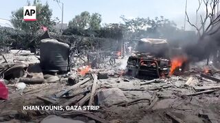 Scores reported dead in Israeli attack on south Gaza, as official says Hamas military chief targeted.