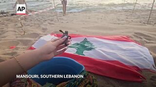 Baby sea turtles released from South Lebanon into Mediterranean sea as hatching season starts.