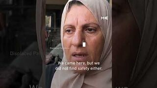 Displaced Palestinians clear rubble after Israeli strike on school in Nuseirat