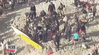 16-Year-Old Gets Stuck in 6-Foot-Deep Sand Hole at Beach.