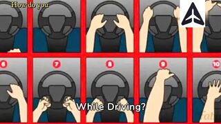 How do you hold the steering wheel while driving