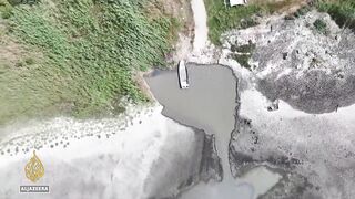 Serbia's Rusanda Lake dries to a pond as the Balkans swelters in a heatwave.