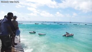 Massive Wave Takes Out Fishermen