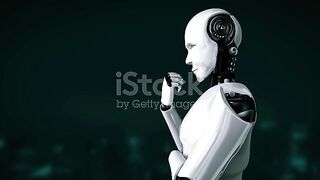 Hominoid robot analysing hologram screen