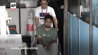 Injured student reacts after Bangladesh's top court scales back controversial jobs quota system.