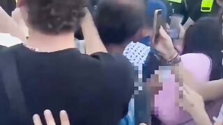 German policemen assaults girl during crackdown on Gaza protest.