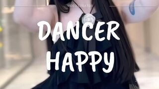Joyful Dance Moves in a Chic Black Dress