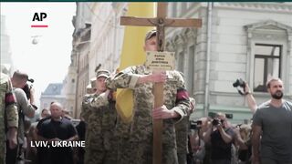 Funeral of former Ukrainian lawmaker and critic of Russia who was killed in Lviv.
