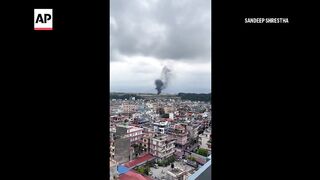 Pilot survives after a plane carrying 19 crashes in Nepal.