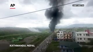 Witness reacts after plane crash kills 18 people in Nepal, pilot lone survivor.