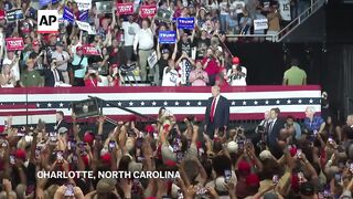 Trump turns his focus on Harris at his first rally since Biden's exit from 2024 race.