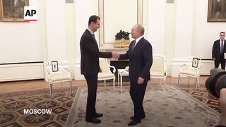 Russian President Putin welcomes Syrian President Assad at the Kremlin.