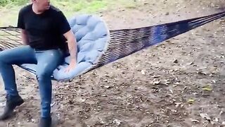 sitting in a hammock without the consent of the goat.