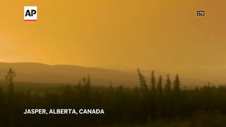 Fast-moving wildfire in the Canadian Rockies ravages the resort town of Jasper.