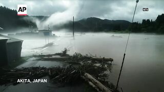 Heavy rain in northern Japan forces hundreds to take shelter.