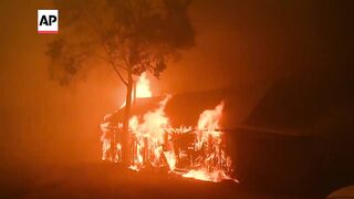 California wildfire sparked by a burning car triples in size in a day.