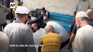 Prayers held for Palestinians killed in Israeli airstrikes on central Gaza Strip.