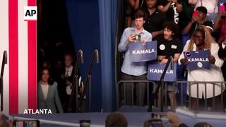 Harris dares Trump at Atlanta rally to 'say it to my face' and debate her.