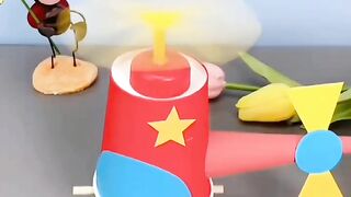 DIY paper helicopter from scratch. Materials used are sticks, paper, elastics, paper cup and accessories