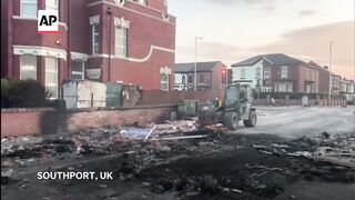 UK stabbing attack_ Residents clean up after clashes in Southport.