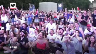 French fan zone explodes in cheers as Leon Marchand clinches second Olympic gold.
