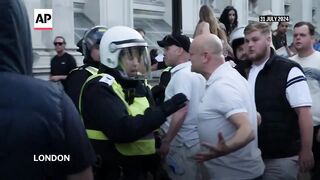 Police clash with protesters in London after UK knife attack.