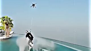 Guy RIDING WITH DRONE !!