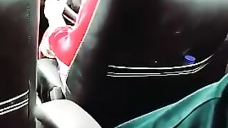 Beautiful girl driving car and singing a song