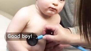 Adorable Baby Boy Cuddles on Nurse 2