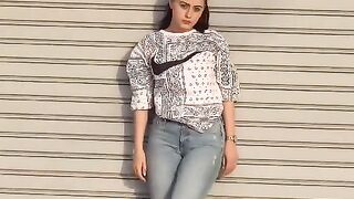 Girl in front of gate