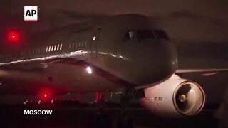 Putin greets Russian prisoners freed in swap with US as they arrive in Moscow.