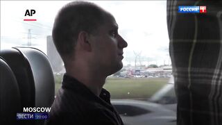 Russian security service footage shows Evan Gershkovich and other prisoners in transit.