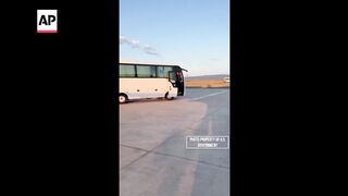 US releases video of freed prisoners boarding plane in Turkey to take them home.