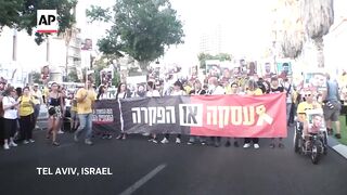 Families and supporters of Israeli hostages held in Gaza mark 300 days of war.
