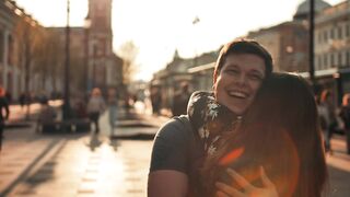 Joyful lovers hugged