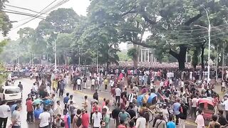 - Look at this crowd. My eyes are blessed.   - Shaheed minar. That’s it. That’s the post.