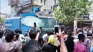 Students throw bottles at police car in quota movement, quota movement, Bangladesh