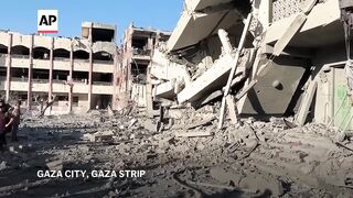 Israeli airstrike hits school housing displaced people in northern Gaza.
