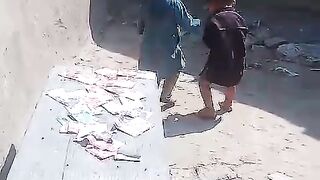 Play child with money
