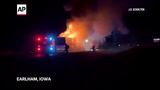Minor league baseball team's charter bus catches on fire in Iowa.