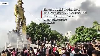 Bangladeshi protesters destroy statue of ousted PM Hasina's father with sledgehammer