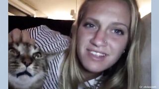 "Cat's Laughing Fit: Too Funny to Miss!"