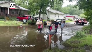 Tropical Storm Debby hits Georgia with rain and floods.