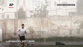 For Palestinian runner, chasing gold comes second to raising the flag at Olympics.